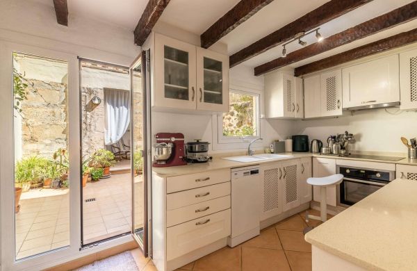 Historic Townhouse in Pollensa with Patio and Terraces for Sale