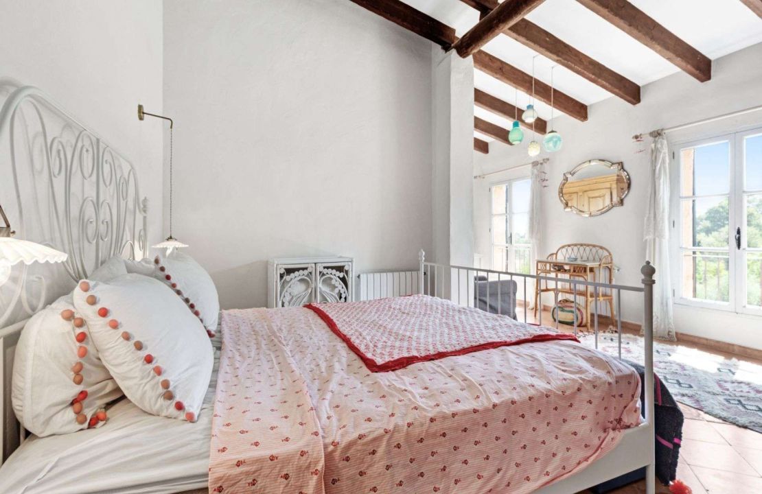 Traditional-style finca home with guest cottage and pool for sale