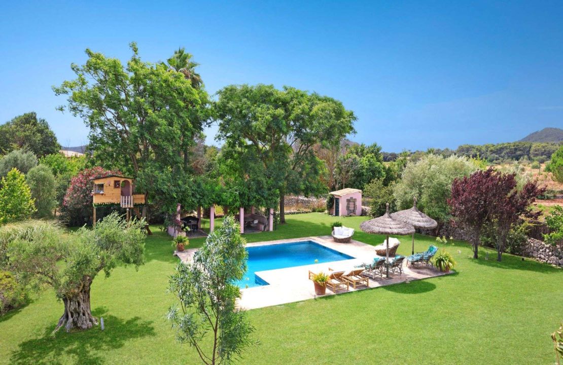 Traditional-style finca home with guest cottage and pool for sale