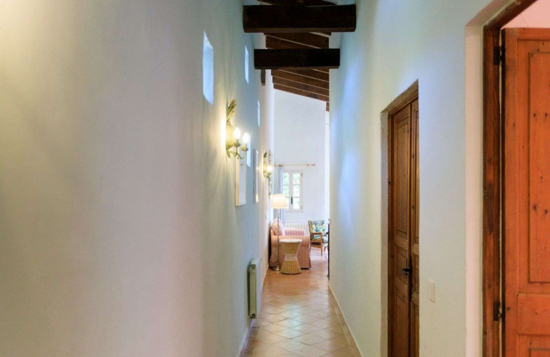 Traditional-style finca home with guest cottage and pool for sale