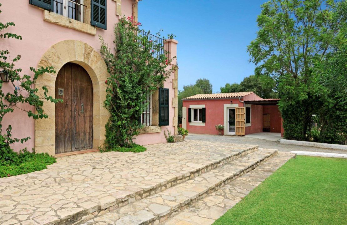 Traditional-style finca home with guest cottage and pool for sale