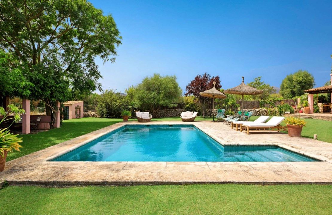 Traditional-style finca home with guest cottage and pool for sale