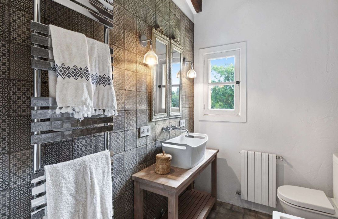 Traditional-style finca home with guest cottage and pool for sale