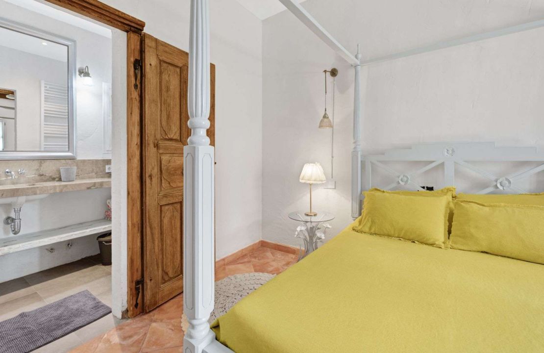Traditional-style finca home with guest cottage and pool for sale