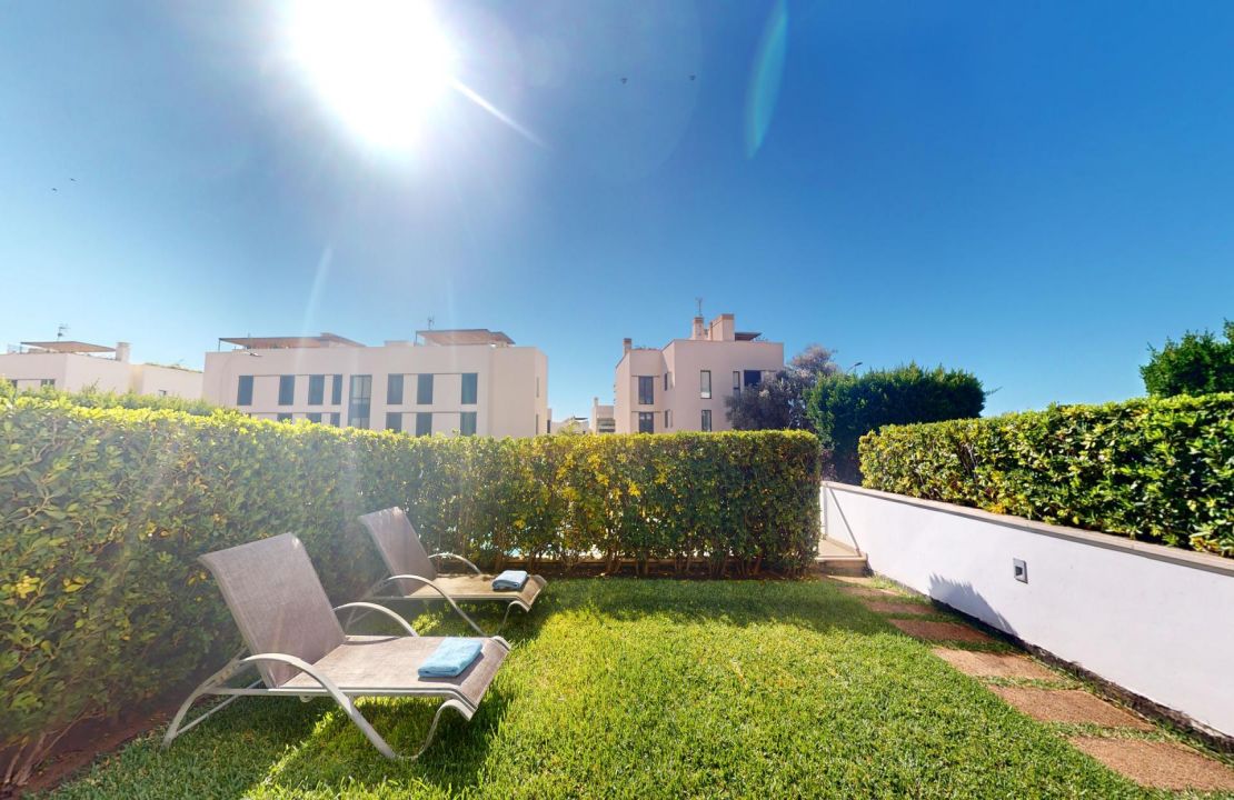 Fabulous ground floor apartment in Puerto Pollensa Mallorca with pool and private garden