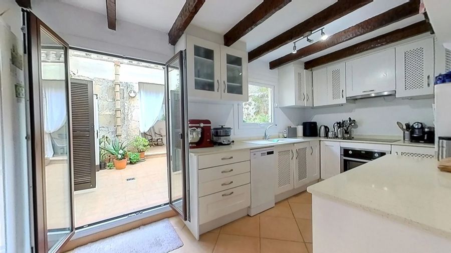 Townhouse in Pollensa for sale with a large patio and terrace spaces